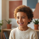 Headshot of a smiling young boy, happy and engaged, with a blurred background in terracotta and dusty blue tones.